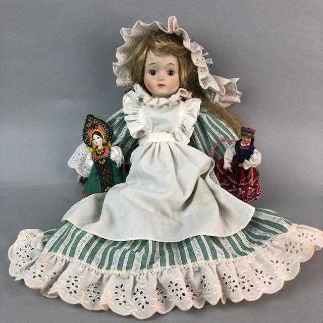 Lot 39 - AN EARLY 20TH CENTURY BISQUE HEADED DOLL AND OTHER DOLLS