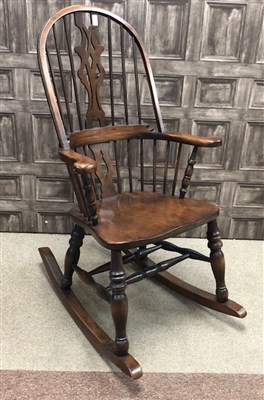 Lot 115 - A REPRODUCTION WINDSOR STYLE ROCKING CHAIR