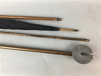 Lot 257 - A VINTAGE 'THE FEATHERWEIGHT' SHOOTING STICK, WALKING STICKS AND AN UMBRELLA