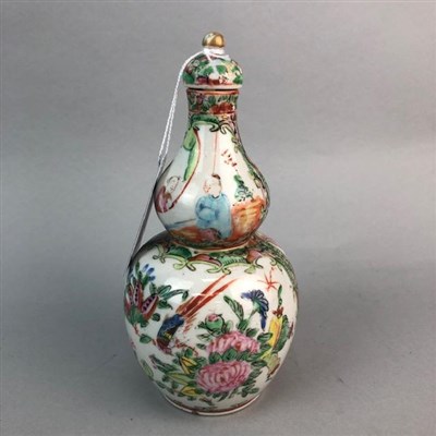 Lot 90 - A CHINESE FAMILLE ROSE DOUBLE GOURD SHAPED VASE AND COVER