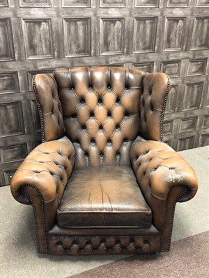 Lot 1662 - AN EARLY 20TH CENTURY BROWN LEATHER WING BACKED SETTEE AND ARMCHAIR