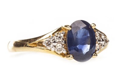 Lot 12 - A BLUE GEM AND DIAMOND RING