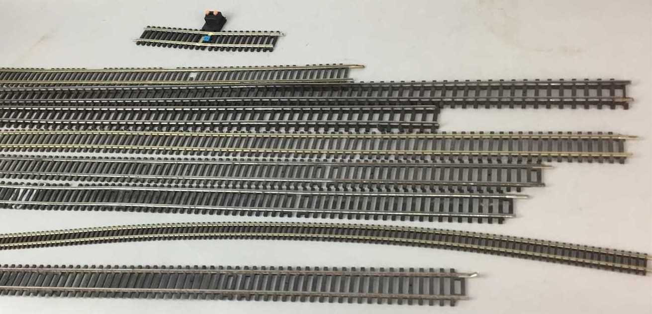 Lot 177 - A COLLECTION OF HORNBY DUBLO MODEL RAILWAY TRACK AND FOUR DUETTE POWER SUPPLY UNITS