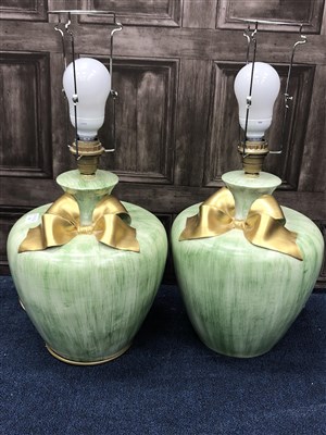 Lot 339 - A PAIR OF GREEN POTTERY TABLE LAMPS
