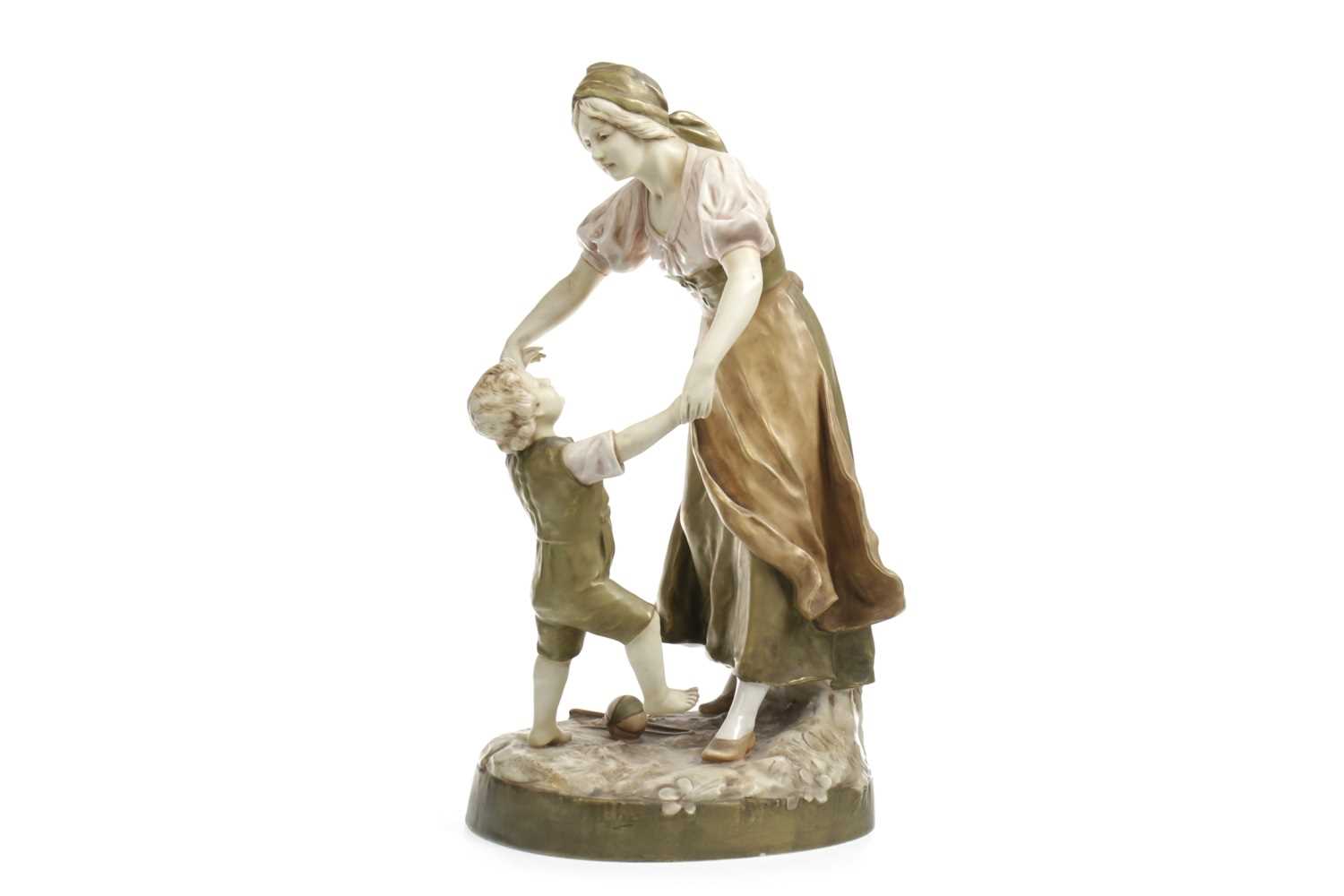 Lot 1294 - A ROYAL DUX FIGURE GROUP OF A MOTHER AND CHILD