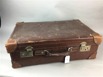 Lot 166 - A LEATHER MOUNTED SUITCASE