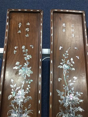 Lot 1143 - A PAIR OF CHINESE MOTHER OF PEARL INLAID WOOD PANELS