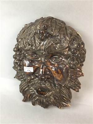Lot 174 - AN ART POTTERY MASK OF BACCHUS