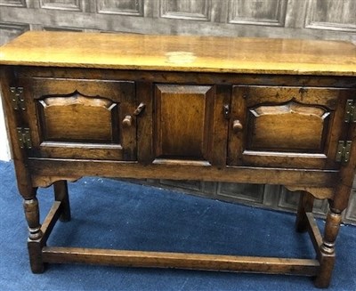 Lot 380 - A REPRODUCTION OAK DRESSER