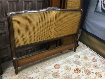 Lot 180 - A CANED DOUBLE BED FRAME