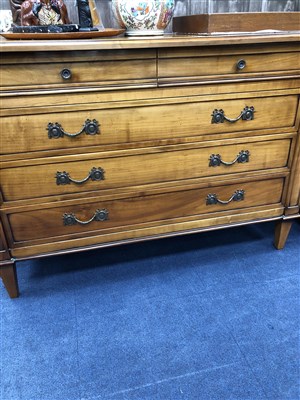 Lot 383 - A REPRODUCTION STAINED WOOD CHEST OF DRAWERS