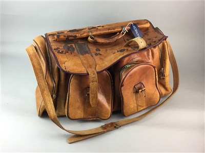 Lot 411 - A VINTAGE LEATHER TRAVEL BAG