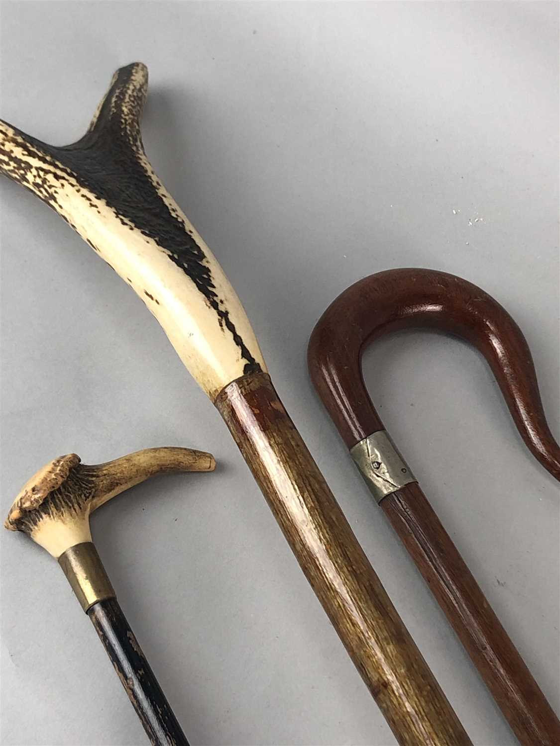 Lot 319 - A COLLECTION OF VARIOUS WALKING STICKS AND PARASOLS