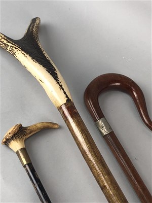 Lot 319 - A COLLECTION OF VARIOUS WALKING STICKS AND PARASOLS