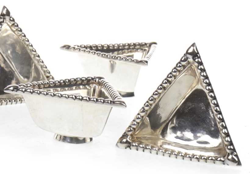 Lot 897 - A LOT OF FOUR SILVER SALT DISHES MODELLED AFTER THE TRAPRAIN TREASURE