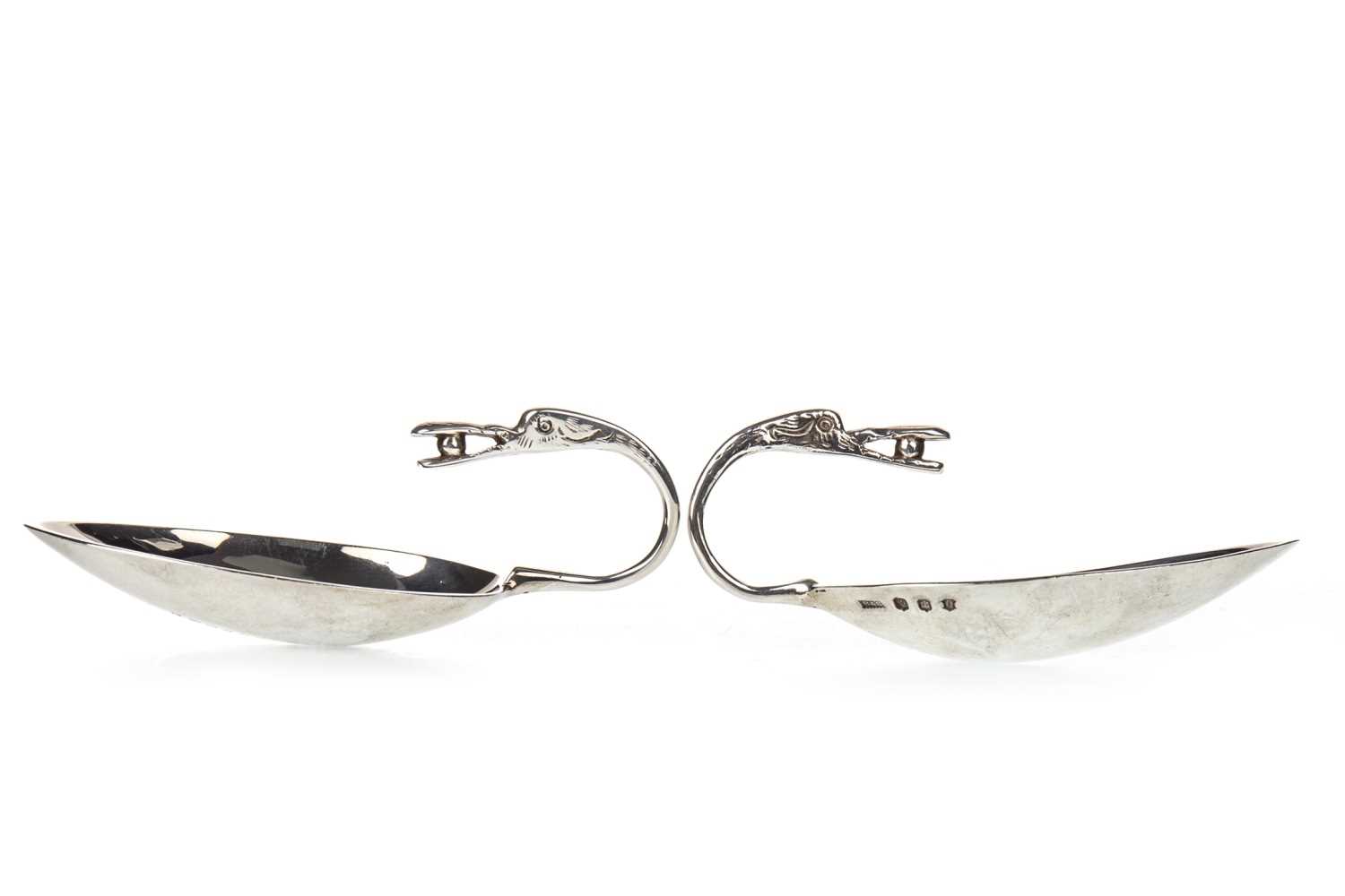 Lot 900 - A PAIR OF GEORGE V SILVER SPOONS MODELLED AFTER THE TRAPRAIN TREASURE