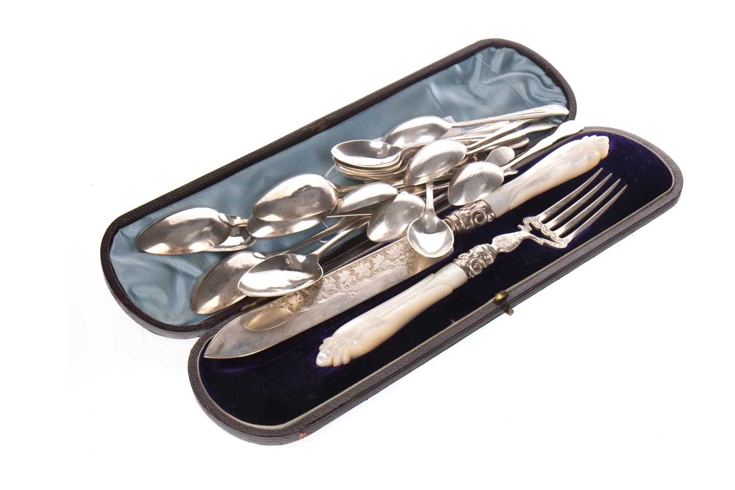 Lot 901 - A VICTORIAN SILVER AND MOTHER OF PEARL SERVING KNIFE AND FORK ALONG WITH SILVER SPOONS