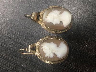 Lot 76 - THREE CAMEOS BROOCHES, A PAIR OF CAMEO EARRINGS AND A RING