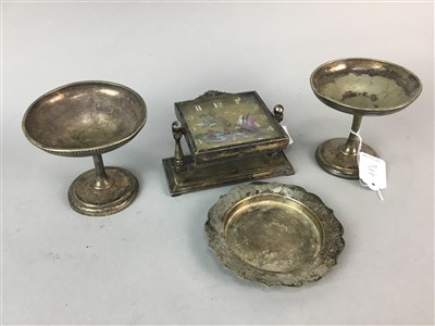 Lot 443 - A SILVER PLATED BEDROOM CLOCK AND THREE DISHES