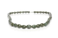 Lot 634 - 20TH CENTURY CHINESE GREEN JADE NECKLACE with...
