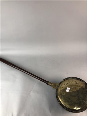 Lot 452 - A GEORGE III BRASS WARMING PAN