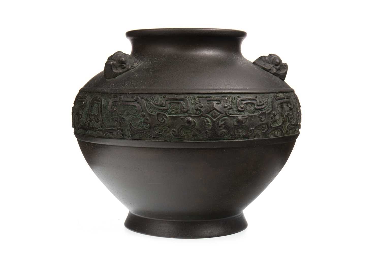 Lot 1189 - A 20TH CENTURY CHINESE BRONZE URN