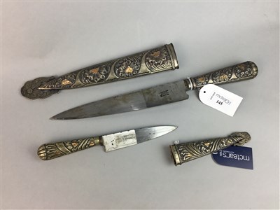 Lot 145 - AN ARGENTINIAN DAGGER AND ANOTHER SIMILAR DAGGER