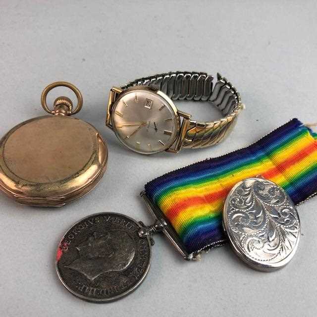 Lot 41 - A GOLD WRIST WATCH, PLATED POCKET WATCH, SILVER LOCKET AND A WAR MEDAL
