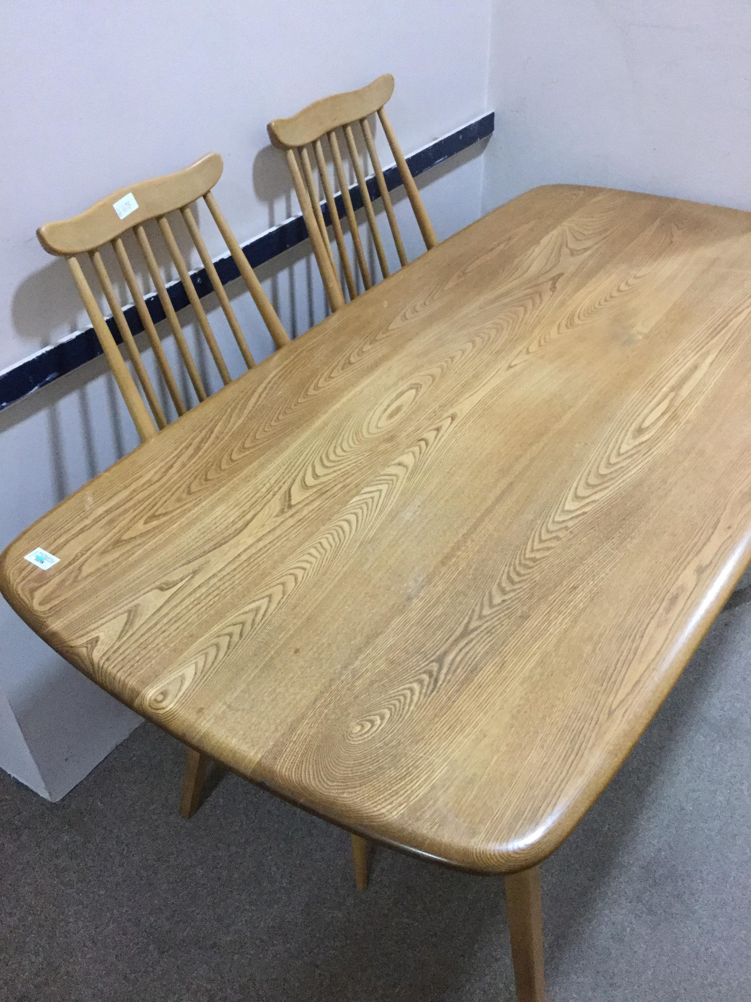 Lot 1698 AN ERCOL LIGHT OAK WINDSOR STYLE DINING
