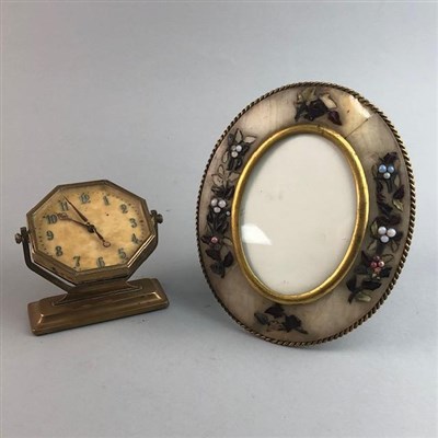 Lot 56 - A HARDSTONE OVAL FRAME AND A CLOCK