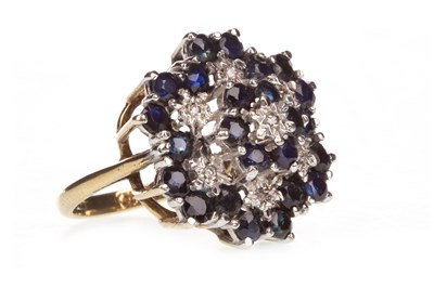 Lot 4 - A BLUE GEM AND DIAMOND CLUSTER RING