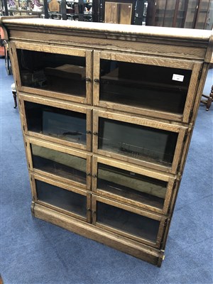 Lot 181 - AN OAK FOUR SECTION STACKING BOOKCASE