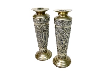 Lot 1025 - A PAIR OF EASTERN SILVER CANDLESTICKS