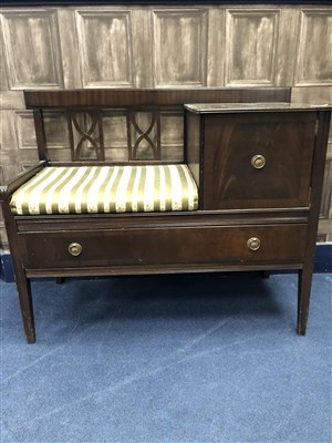 Lot 257 - A MAHOGANY TELEPHONE TABLE