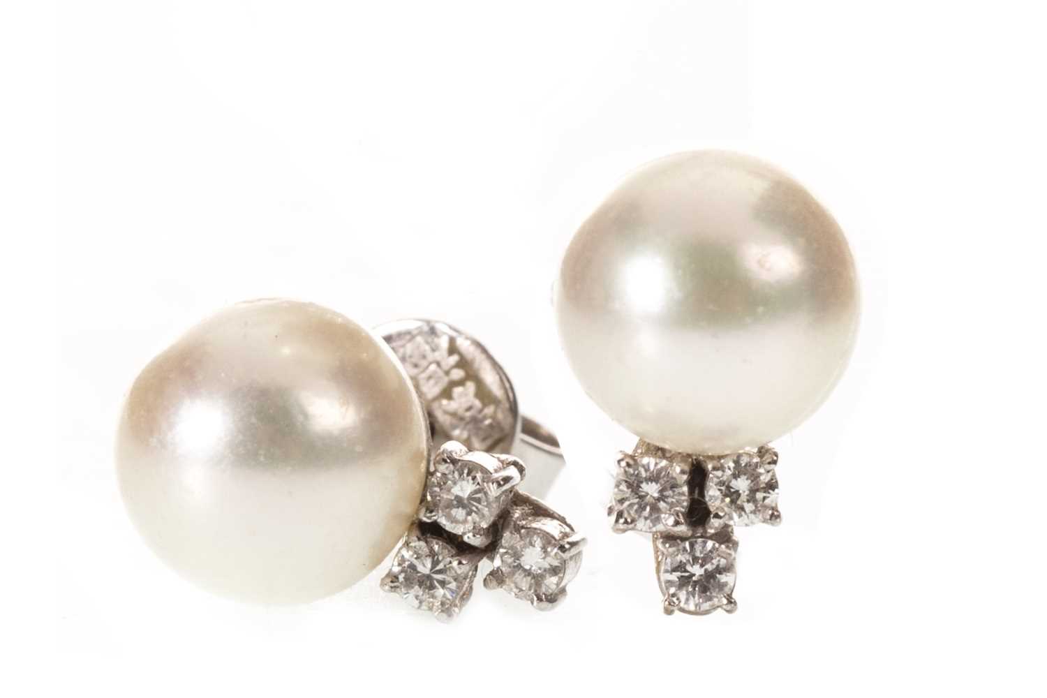 Lot 4 - A PAIR OF PEARL AND DIAMOND STUD EARRINGS