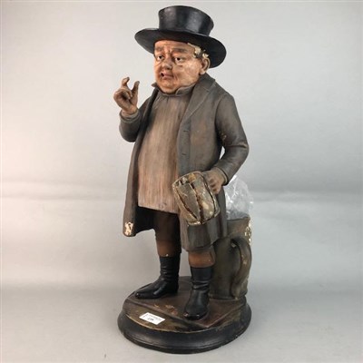 Lot 239 - A GERMAN POTTERY FIGURE OF A MAN