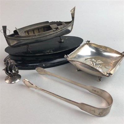Lot 98 - A CONTINENTAL SILVER MODEL OF A BOAT, SILVER TONGS AND ANOTHER DISH