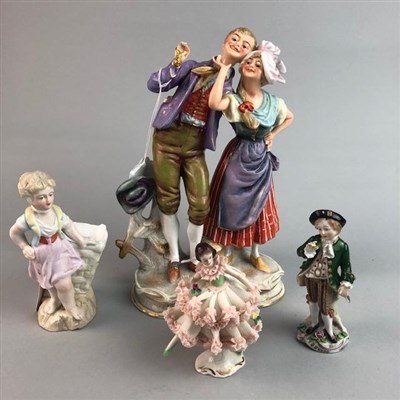 Lot 97 - A CONTINENTAL CERAMIC FIGURE GROUP AND THREE OTHER FIGURES