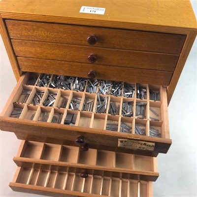 Lot 171 - A MINIATURE CHEST OF EIGHT DRAWERS WITH PRINTERS TYPE