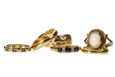 Lot 42 - TWO RINGS AND FOUR GOLD BANDS
