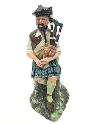 Lot 50 - A ROYAL DOULTON FIGURE OF 'THE PIPER'