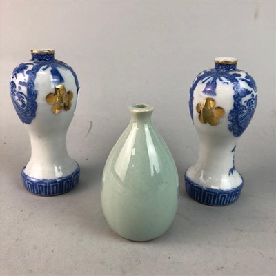 Lot 356 - A SMALL PAIR OF CHINESE BLUE AND WHITE BALUSTER VASES AND A CELADON VASE