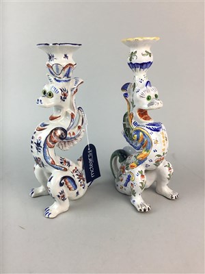 Lot 110 - A PAIR OF FRENCH FAIENCE GRIFFIN CANDLESTICKS