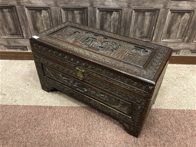 Lot 1022 - A CHINESE CARVED WOOD CHEST