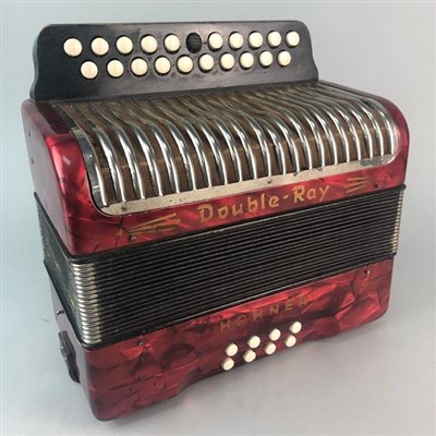 Lot 119 - A SMALL HOHNER BUTON ACCORDIAN