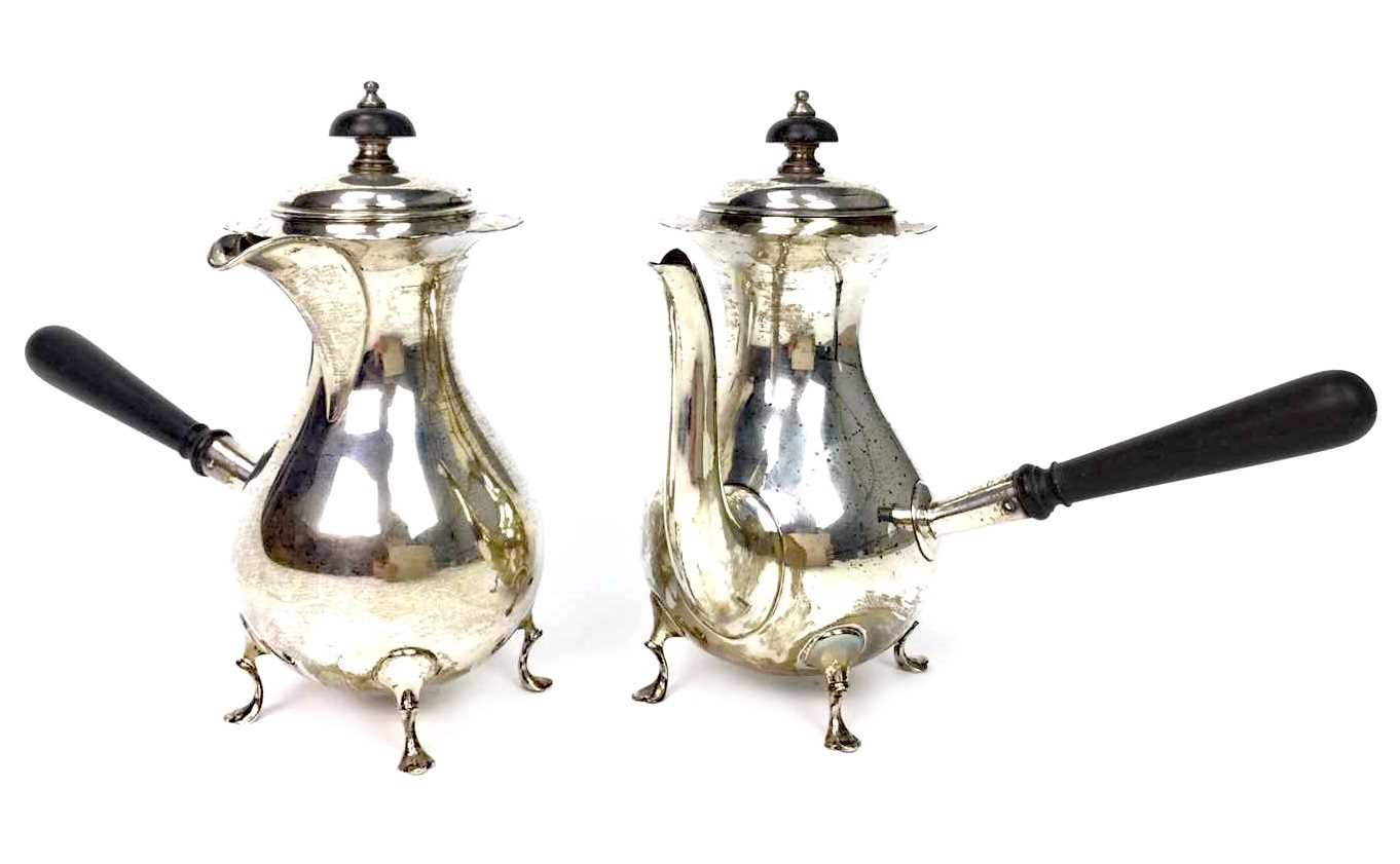 Lot 828 - A SILVER COFFEE POT AND WATER JUG