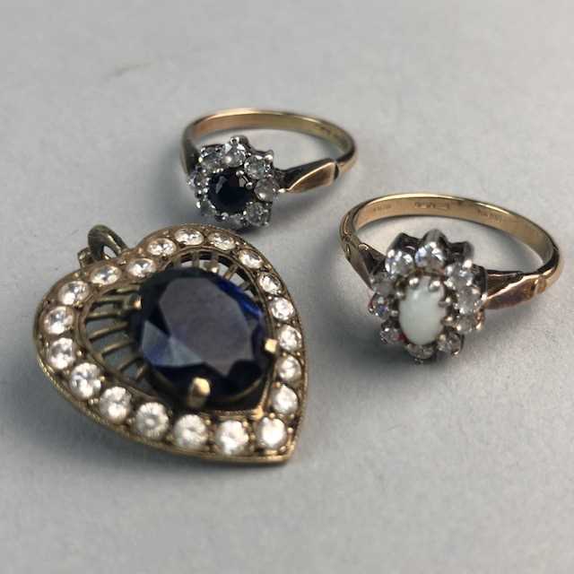 Lot 4 - TWO GOLD PLATED RINGS AND A PENDANT
