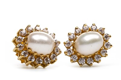 Lot 136 - A PAIR OF PEARL AND GEM SET CLUSTER EARRINGS