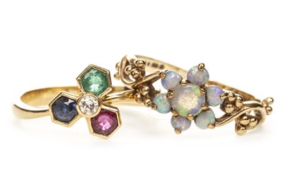Lot 143 - A GEM SET RING AND AN OPAL RING