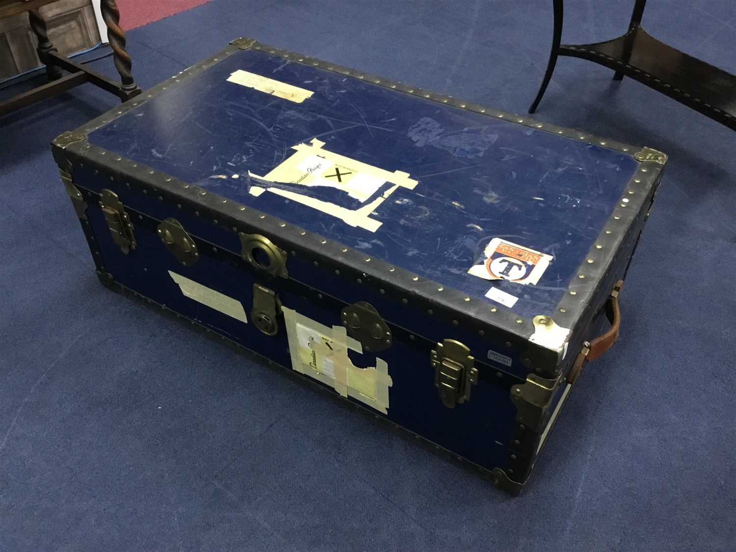 Lot 278 - A VINTAGE BRASS BOUND TRAVEL TRUNK